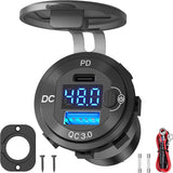 A black DC-Direct wall outlet with a digital display showing voltage, featuring USB-C PD 3.0 and QC 3.
